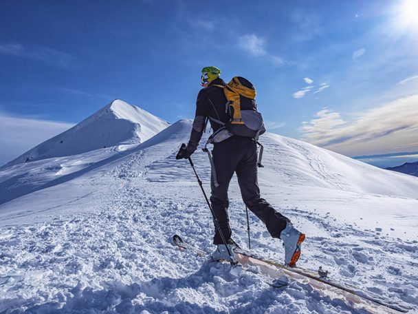 Ski mountaineer in the italian alps - Photo, Image