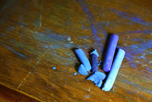 A few pieces of blue soft pastel chalk. Professional materials for Art. - Foto, Imagem