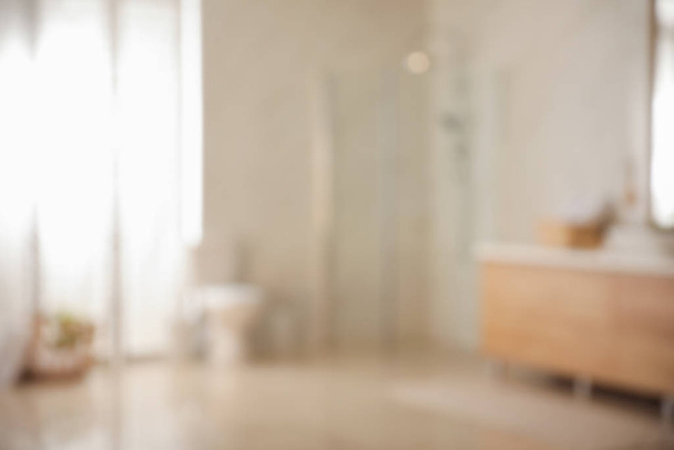 Blurred view of light modern bathroom interior - Foto, Imagen