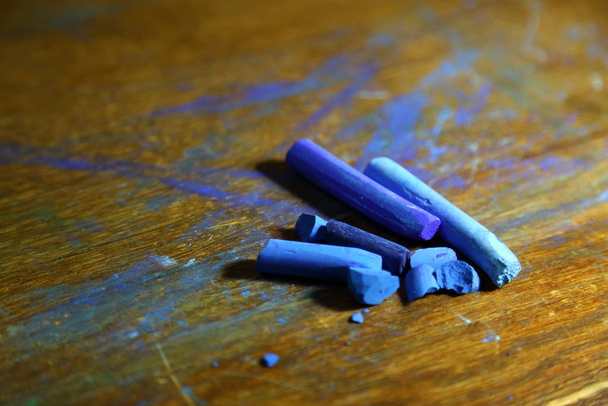 A few pieces of blue soft pastel chalk. Professional materials for Art. - Foto, Imagem