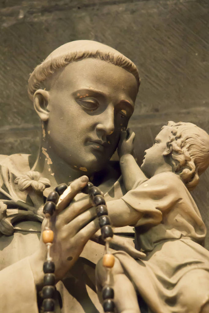 Carcassonne, France, 25 június 2019: Old figure of Saint Anthony i - Fotó, kép