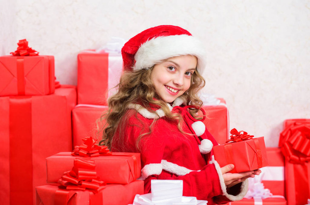 Santa bring her gift. Unpacking christmas gift. Happy new year concept. Winter holiday tradition. Girl celebrate christmas open gift box. Opening christmas gift. Kid happy with christmas present - Foto, immagini