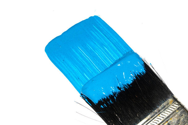 Blue Acrylic Paint Stroke with Paint Brush on White Background - Фото, изображение