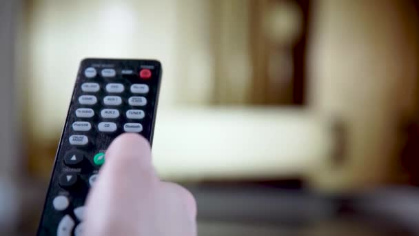 television remote control remotely via a TV remote control, switching program - Footage, Video