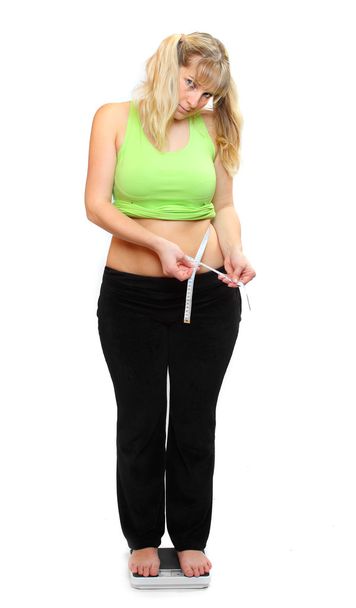 Woman measure her waist belly - Φωτογραφία, εικόνα