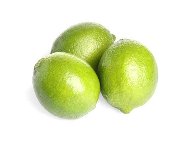 Fresh green ripe limes isolated on white - Foto, Bild