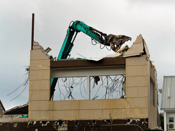 Grab crane demolishing a house / building - Photo, Image