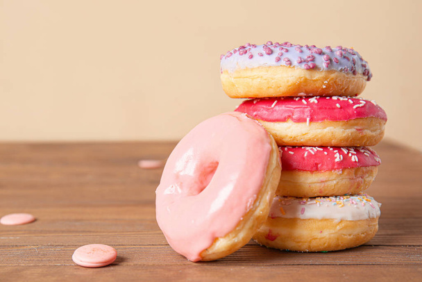 Sweet tasty donuts on table - Zdjęcie, obraz