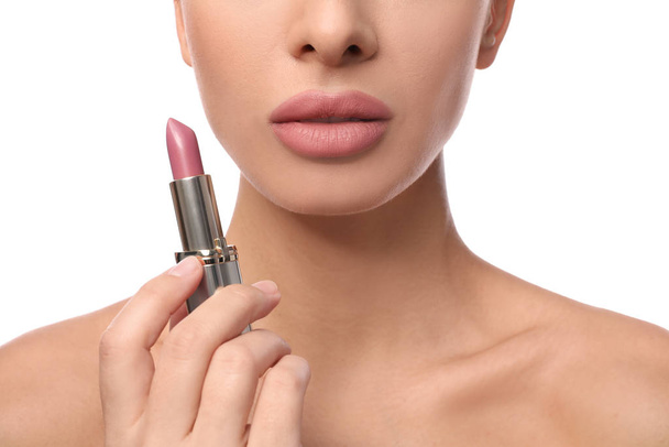 Woman with pink lipstick on white background, closeup - Фото, зображення