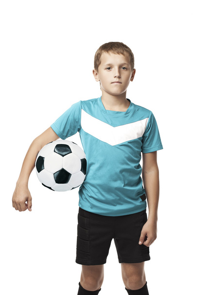 Un garçon tenant un ballon de foot
 - Photo, image