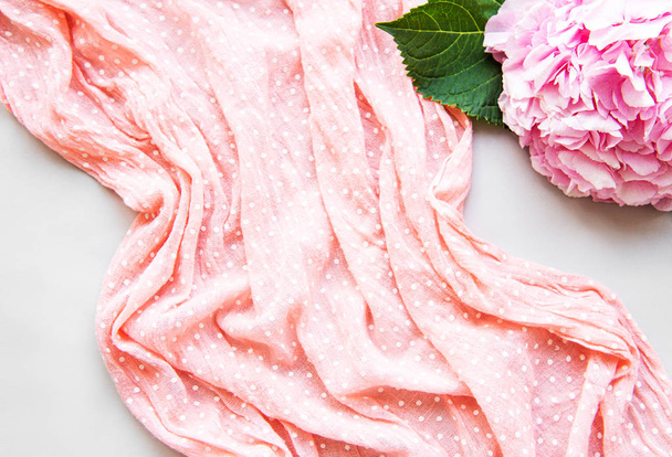 Beautiful pink hydrangea and scarf with polka dot - Фото, изображение