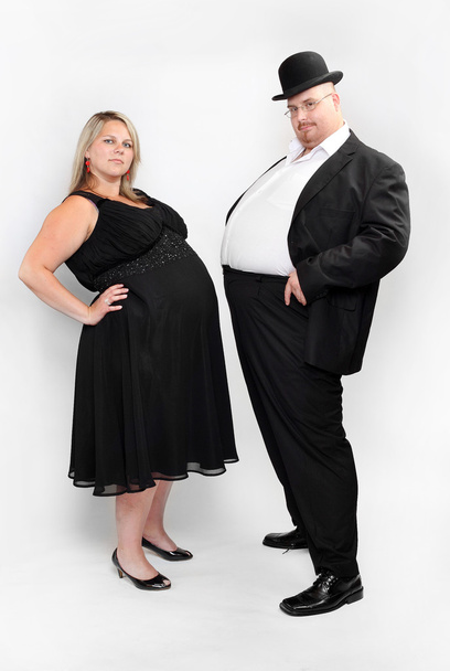 Dos empresarios con sobrepeso. Concepto de competencia y sexismo
. - Foto, imagen