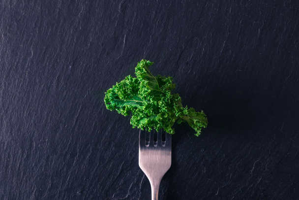 fork with vegetable vegan or vegetarian diet concept - Fotó, kép