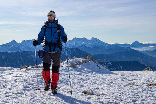 Mountaineer walking at the top of the Peca mountain, Slovenia - Фото, изображение