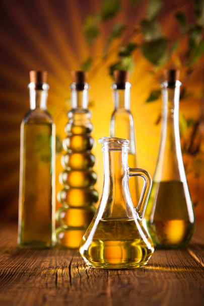 Olive oil in bottles - Foto, afbeelding