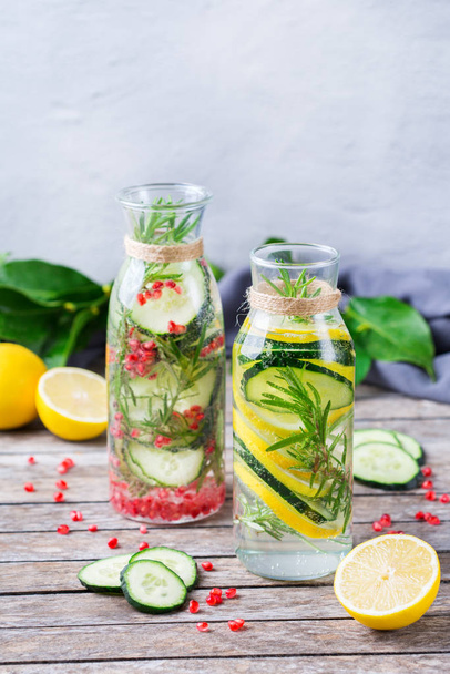 Fresh cool lemon cucumber rosemary infused water detox drink - Photo, Image