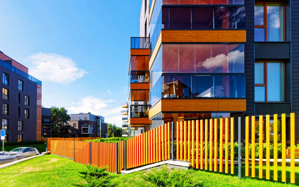 Fence at Modern architectural complex of residential buildings reflex - Photo, Image