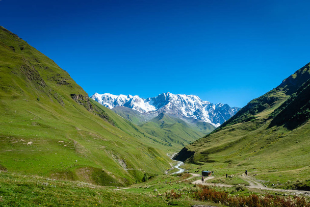 Ushguli landscape with mount Shkhara in the back in Svaneti region, Georgia. - Фото, изображение