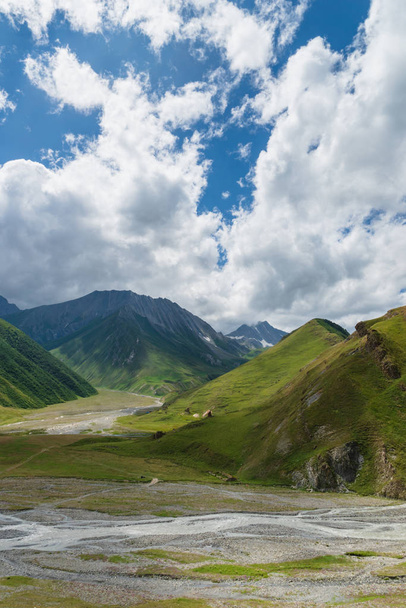  Truso Valley and Gorge area landscape on trekking / hiking route, in Kazbegi, Georgia. Truso valley is a scenic trekking route close to the border of North Ossetia. - Foto, imagen