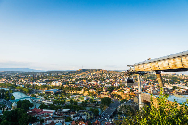 Tbilisi, Georgia - August 2019. Tbilisi downtown and old town aerial from Tbilisi funicular in the capital of Georgia at sunset. Tbilisi is the capital and the largest city of Georgia. - Valokuva, kuva