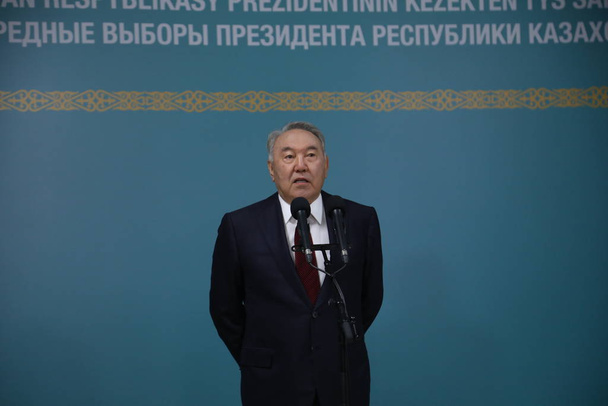 Nursultan Nazarbayev speaking on microphone on early presidential elections on June 9, 2019 in Astana, Kazakhstan - Foto, immagini
