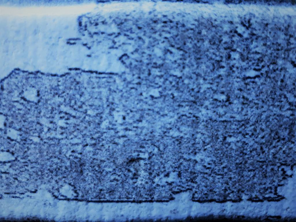 gros plan de la surface murale abstraite décorative avec effet flou / bokeh dans la couleur bleue classique
 - Photo, image