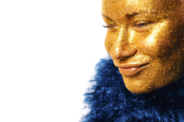 Gilt. Golden Woman's Face Closeup. Futuristic Gilded Make-up. - Фото, изображение