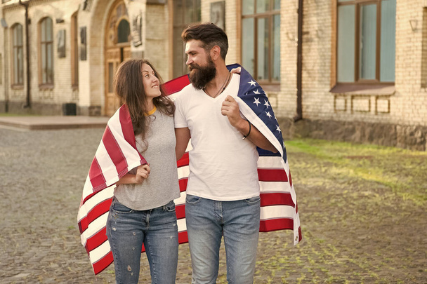 Visa applicants. Couple in love getting visa of united states. Bearded man and sensual woman wearing usa flag on independence day. Applying for visa to american citizenship. Visa or travel permit - Fotografie, Obrázek