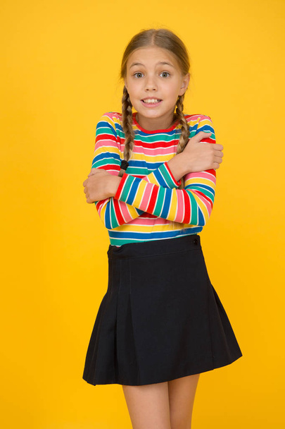 Just freezing here. Fashion shop. Must have accessory. Modern fashion. Kid fashion. Cute child trendy and fancy. Little girl wearing rainbow clothes. Emotional kid. Cold weather. Need warm clothes - Zdjęcie, obraz