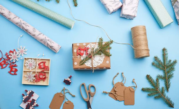 gifts on a blue background, top view. Christmas holiday concept - 写真・画像
