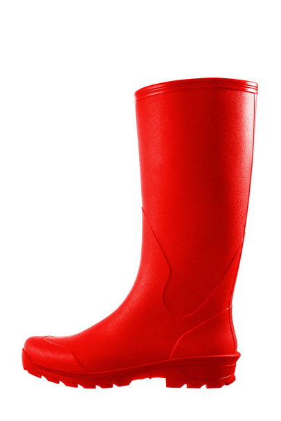 Rode rubberen laarzen geïsoleerd op witte achtergrond - Foto, afbeelding