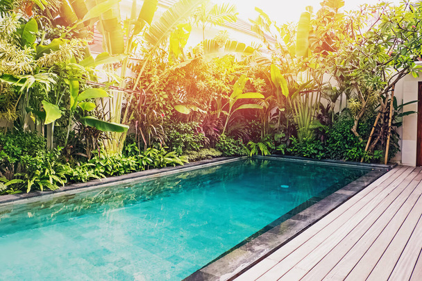 Empty swimming pool in luxury villa with tropic plants - Photo, image