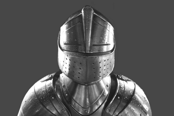 Knight in shining armor. Detail metal helmet. Medieval warrior. isolated on white or gray background.  - Фото, зображення