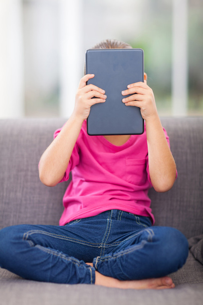 little girl behind a tablet pc - Photo, Image