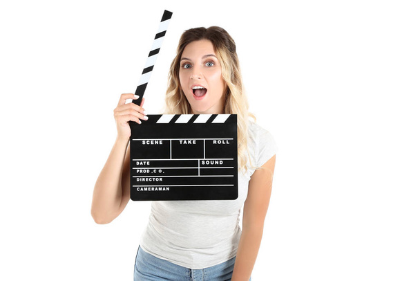 Young woman with blank clapper board on white background - Фото, зображення