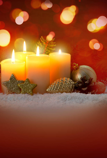 Four yellow burning advent candles. Christmas card. - Foto, Bild