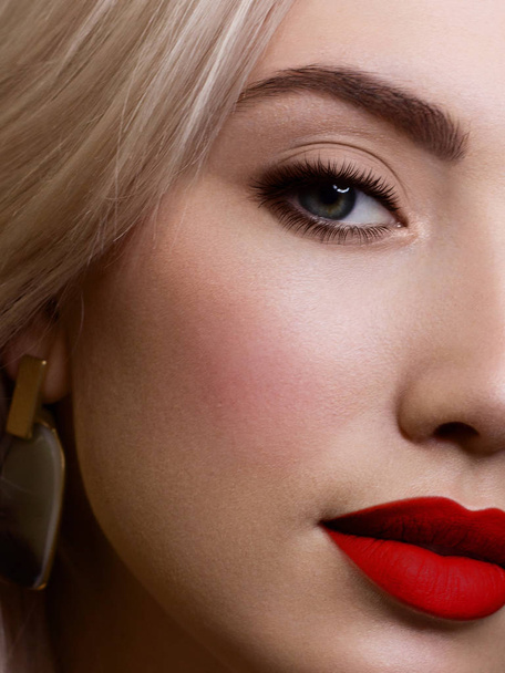 Half beauty Fashion woman lips with evening Makeup and beige Nail polish Matte lipstick and nails.Beauty girl face close up. Red Colors. Sexy lips, Manicure, Make up, glowing skin, autumn, lovely - Фото, зображення