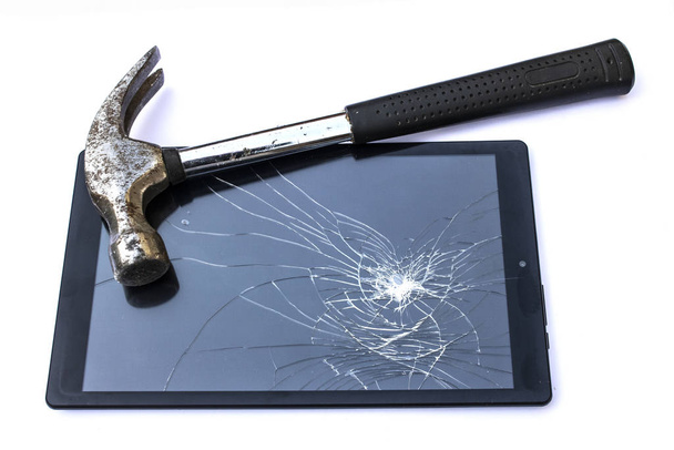 Smashed Screen Vandalised Broken Glass Close Up With Hammer - Foto, Imagem