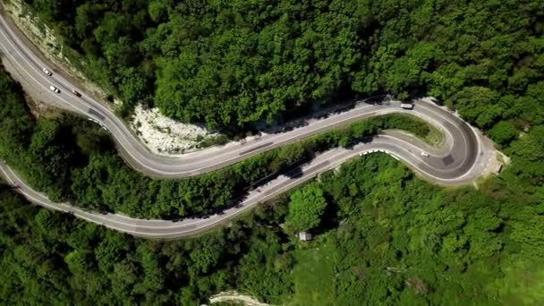 aerial fly under curved winding road - Footage, Video