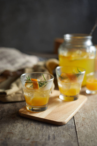Navel orange cocktail with rosemary - Фото, изображение