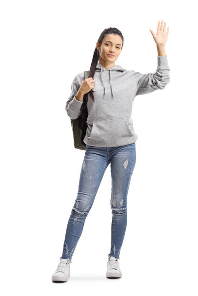 Female student waving - Foto, afbeelding