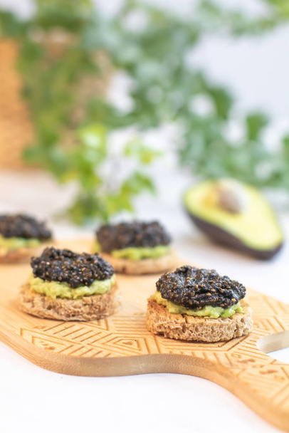 Black caviar vegan vegetarian holiday food - Foto, Bild