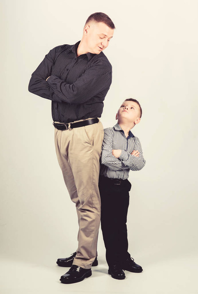 childhood. parenting. fathers day. father and son in business suit. happy child with father. business partner. little boy with dad businessman. family day. happy childhood. childhood concept - Фото, зображення