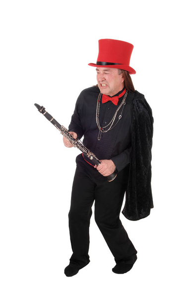 Muzikant man dansen met zijn klarinet - Foto, afbeelding
