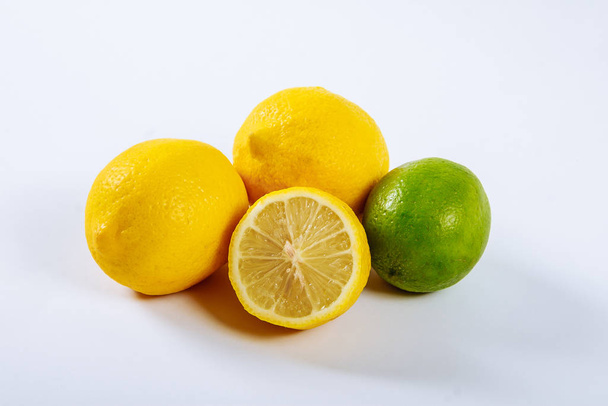 Lemon on a white background. The concept of a healthy diet, weight loss. - 写真・画像