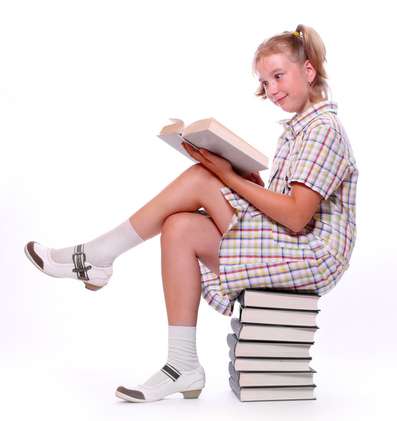 Happy girl with books. Back to school. - 写真・画像