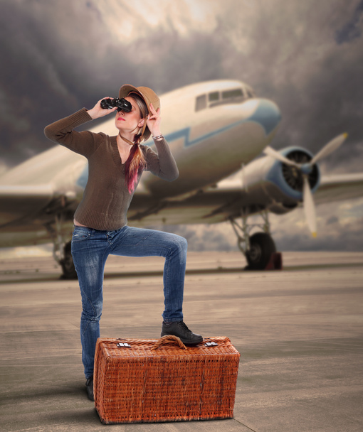Retro style picture of the traveler on the airport - Photo, Image