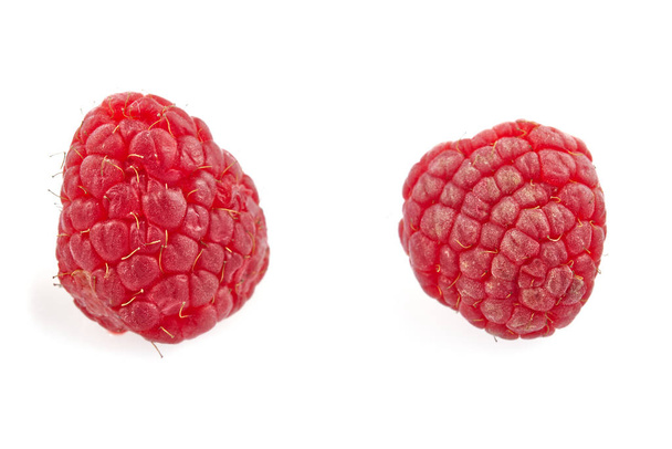 Collection of ripe red raspberries on white background. - Photo, Image