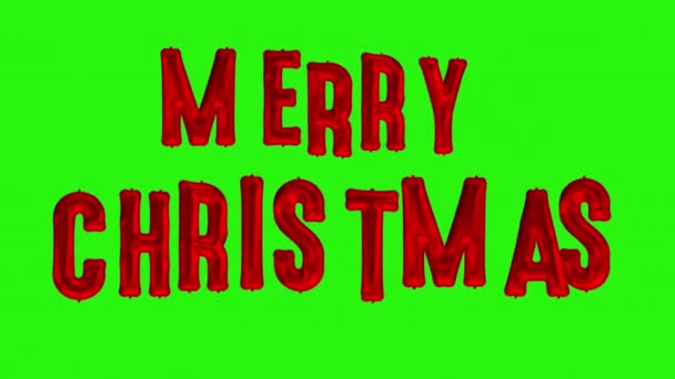 Hyvää joulua. Punainen folio ilmapallot MERRY CHRISTMAS vihreällä näytöllä
 - Materiaali, video