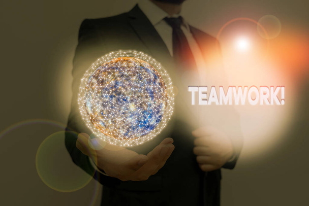 Word writing text Teamwork. Business concept for combined action of group especially when effective and efficient Elements of this image furnished by NASA. - Photo, Image